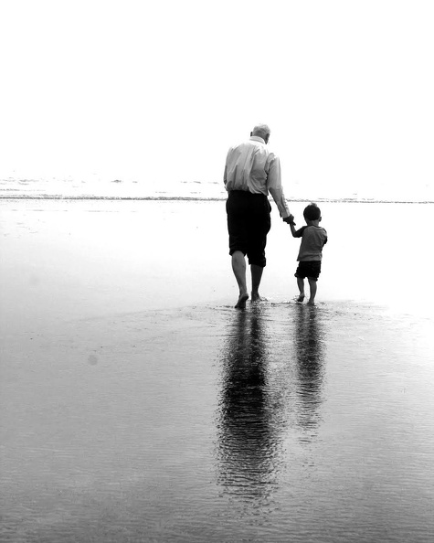 Generation gap - Grandfather and grandson ambling on Alibaug beach. I fill the gap therein!